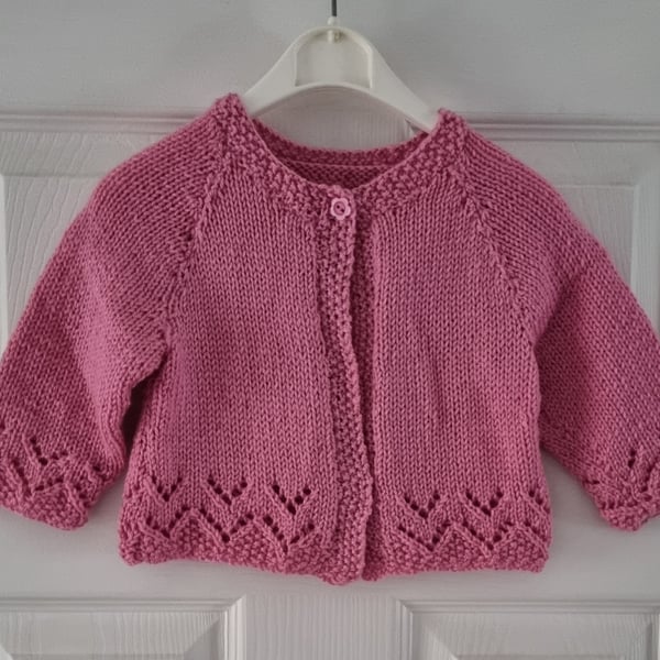 Baby girl hand knitted pink cardigan 