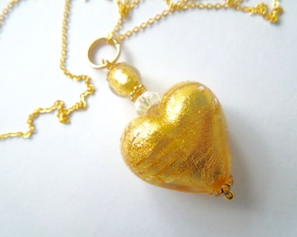 Gold Murano glass heart pendant with Swarovski crystal and gold chain.