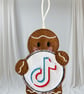 Gingerbread man holding a TikTok sign Embroidered Hanging Keepsake 