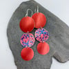 Statement anodised aluminium 3 circle dangly earrings in red