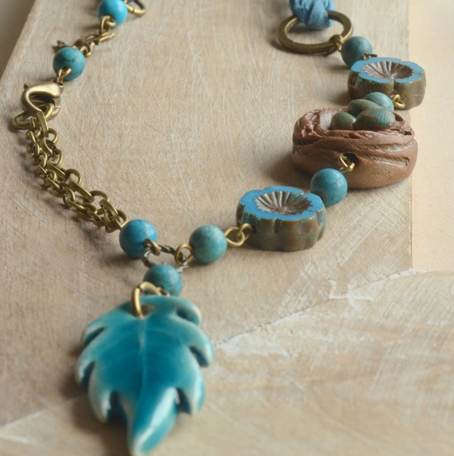Blue Ceramic Leaf Pendant, Polymer Birds Nest, Czech Beads & Sari Silk Ribbon