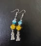 Silver lighthouse charm dangle earrings with yellow and blue beads - Image 3