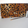 Animal print clutch bag