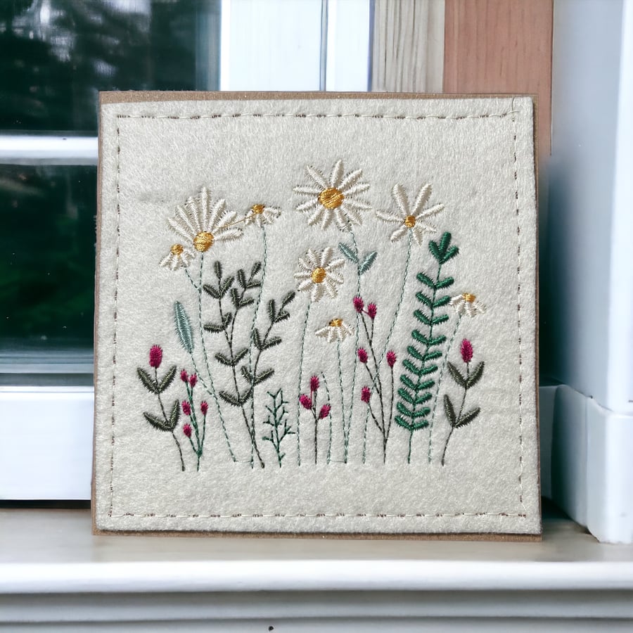 Handmade embroidered greetings card featuring wild meadow flowers. 