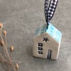 Ceramic hanging house decoration .