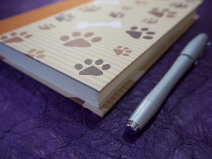 Quarter-bound A5 Chunky Journal with paw print cover