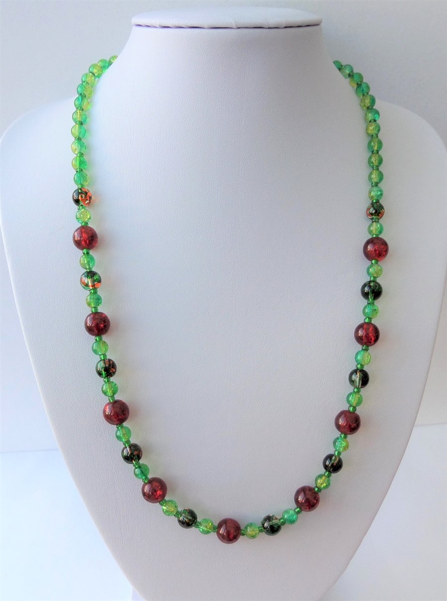 Green, yellow and red glass beaded necklace.