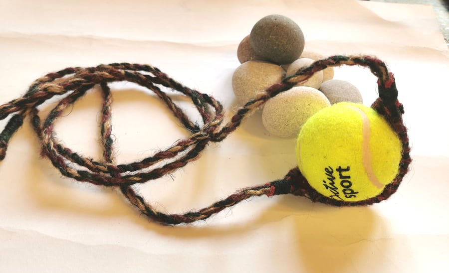 Shepherds sling ball thrower slingshot 