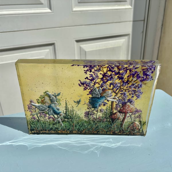 A resin layered and acrylic hand painted fairy scene by Andrew Jenkins