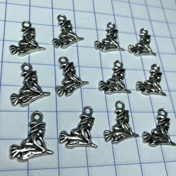 12 small witch on broomstick charms
