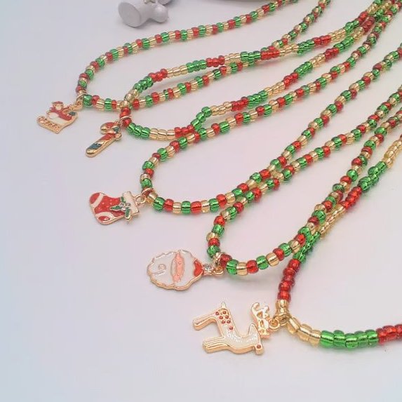 Red Gold and Green Bead Necklace with Gold Plated Enamelled Christmas Charms