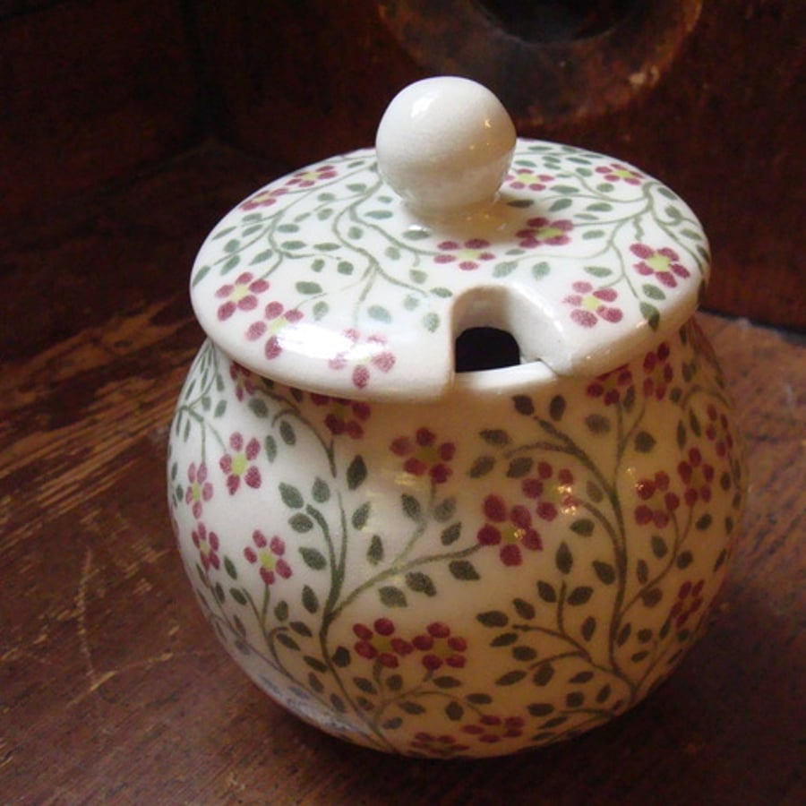 Flowered lidded stoneware sugar bowl