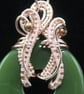 Wire wrapped jade green donut pendant - Image 9