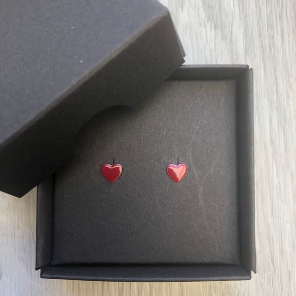 Dark red enamel heart studs. Sterling silver studs.