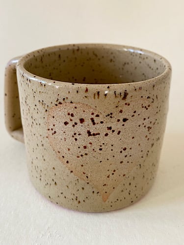 Little love heart speckled clay cup.