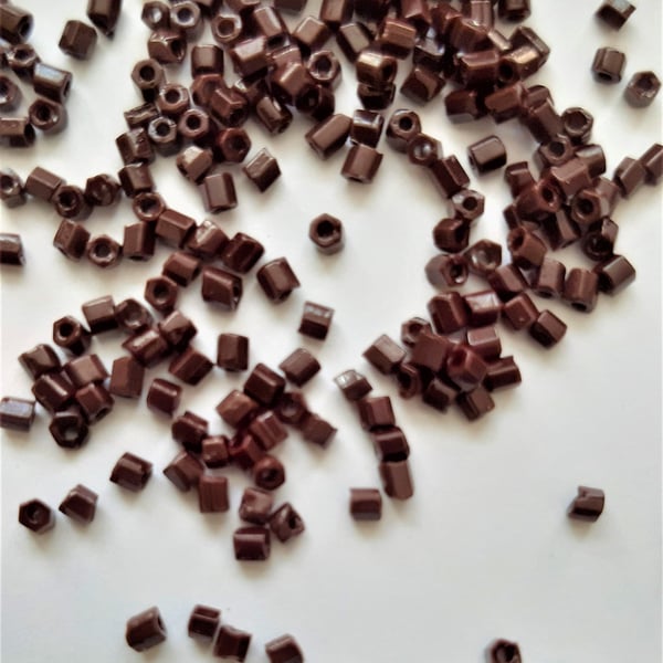 Dark Brown Hexagon beads, size 11.