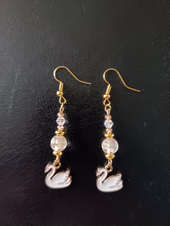 White and gold swan charm beaded dangle earrings 