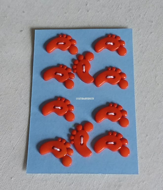 ORANGE FEET SHAPED BUTTONS WITH TWO HOLES FOR ATTACHING 