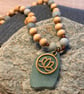 Necklace. Seaglass with Bronze Lotus Flower Charm, Wooden and Amazonite Beads