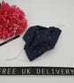 Face mask,  small, 3 layer, adjustable, washable in navy dot - Image 1