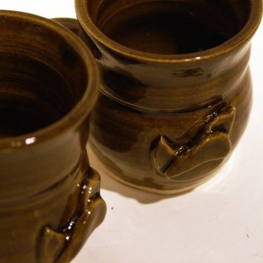 Two wren pottery mugs - wheel thrown signature tableware mugs in brown