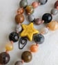 Jasper knotted cord necklace in earthy colours with yellow howlite star - Image 6