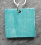 Handmade Ceramic Coastal scene pendant in turquoise - Image 5