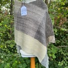 Handwoven, handspun scarf in shades of brown, grey, yellow, green and cream.