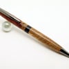 Centre twist ballpoint pen in Bubinga with blackwood centre ring