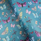 Marbled butterflies and moths wrapping paper on teal 70x50cm