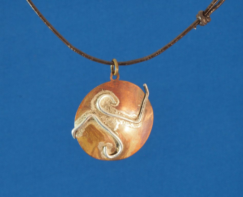  Opposites Copper and Silver Circular Pendant