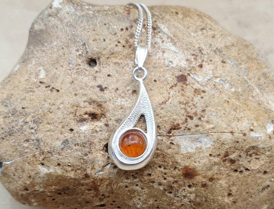 Teardrop Amber pendant necklace. 925 sterling silver