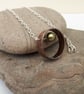 Copper and Silver Ring Pendant with Mobile Pearl Bead - Image 1
