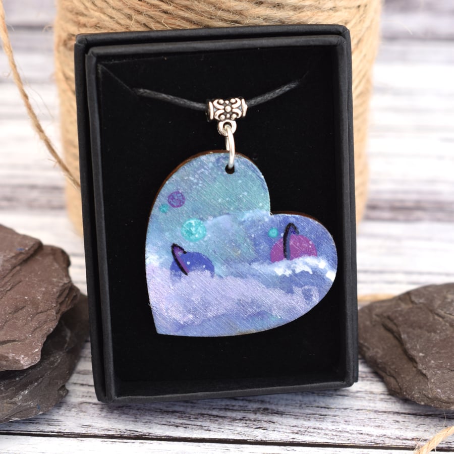 Far away galaxy necklace. Wooden heart pendant with planets.