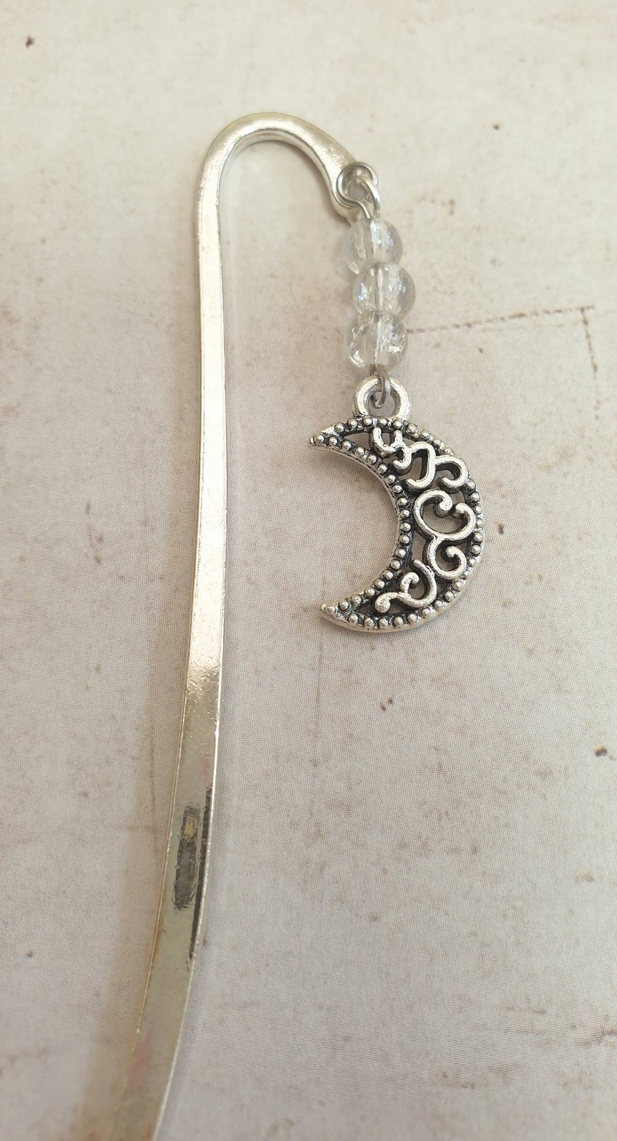 Silver-plated bookmark with Crescent Moon Charm and Three Clear Beads