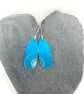 Turquoise anodised aluminium ammonite drop earrings - Image 2