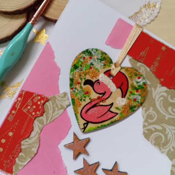 Christmas card with a wooden flamingo decoration
