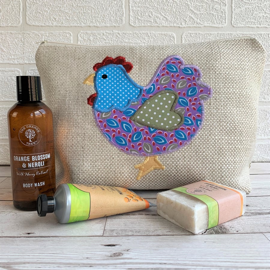 Chicken toiletry bag, wash bag in cream fabric with mauve and turquoise chicken