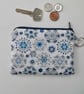Coin purse in blue and white print fabric