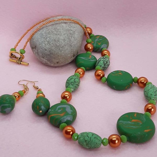 Green and burnt orange necklace and matching earrings