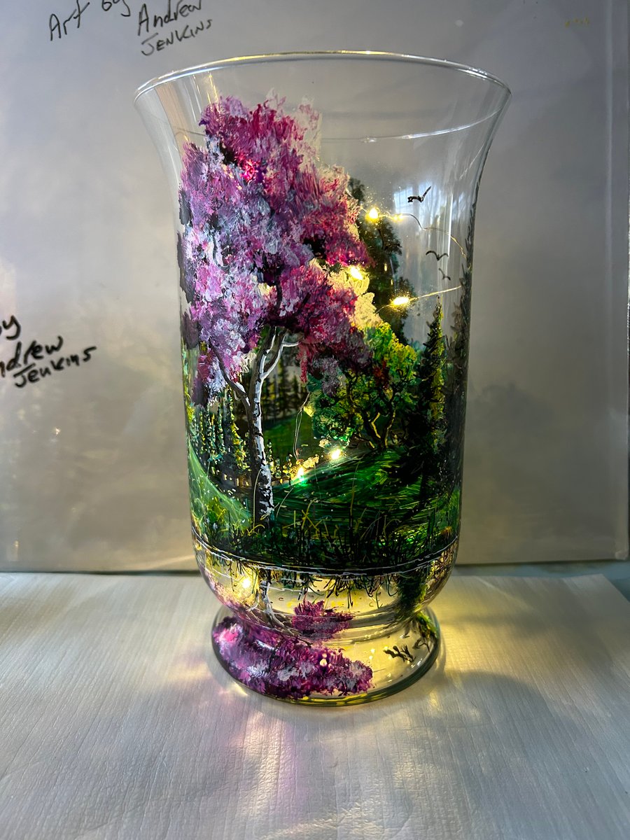 A hand painted and fired glass vase by Andrew Jenkins 