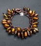 Amber and Copper Tone Cluster Bead Bracelet with Wire Spirals - Image 2
