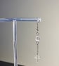 Anian - Clear Cross Asymmetrical Earrings  - Image 3