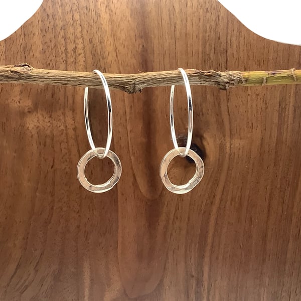 Sterling silver hoop earrings with hammered effect circles
