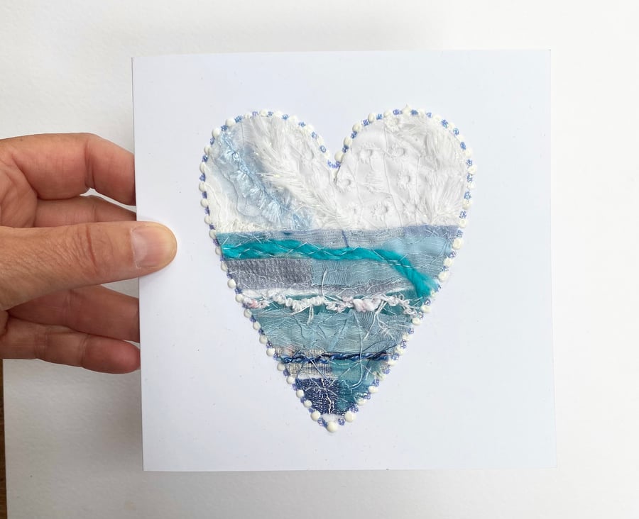 Up-cycled handmade fabric embroidered heart art card. 