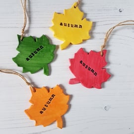 "Autumn" leaf shaped hanging decoration, one supplied