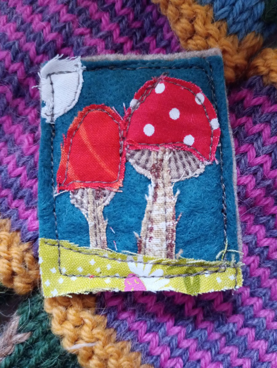 Felt and fabric machine embroidered toadstool brooch