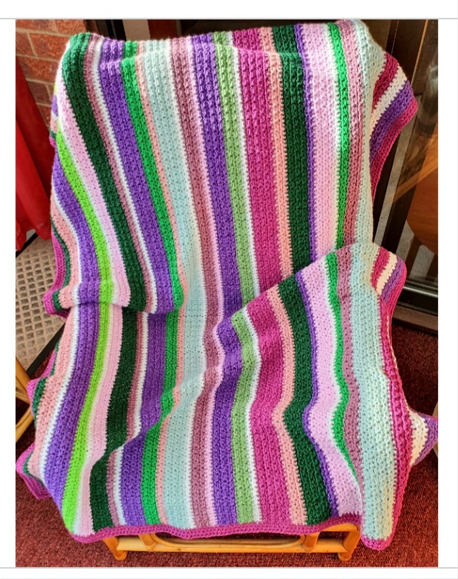Multi coloured crochet Lap Blanket.