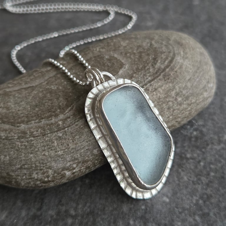Pale blue sea glass pendant in sterling silver