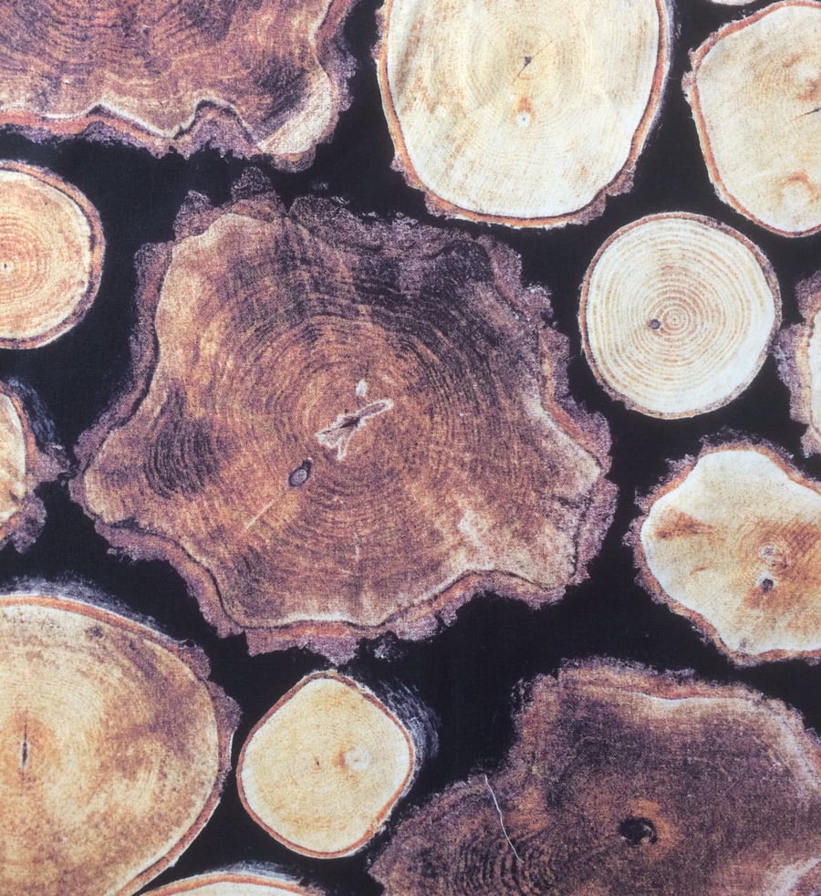  Log Wood Grain on a Black Background Scandi theme Fabric for sale
